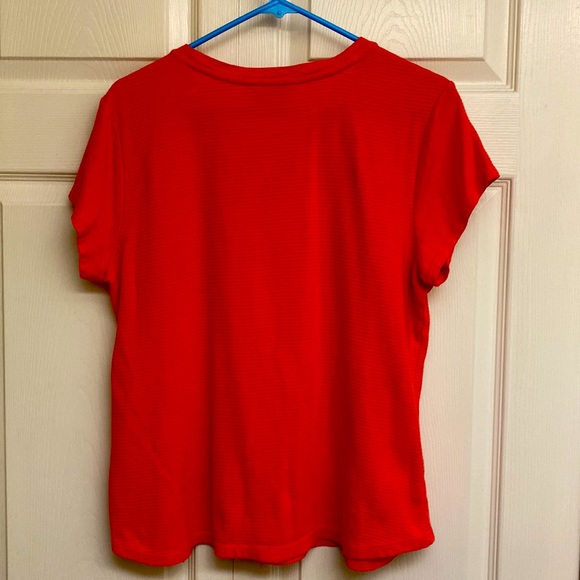 Orange top with decorative shoulder buttons - Picture 2 of 4